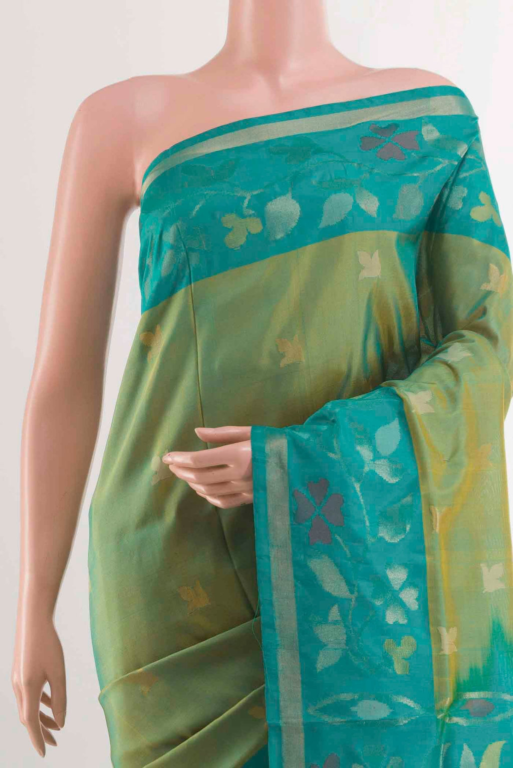 Border image of Green Uppada Silk Saree with Zari Butta on the body and Zari Border