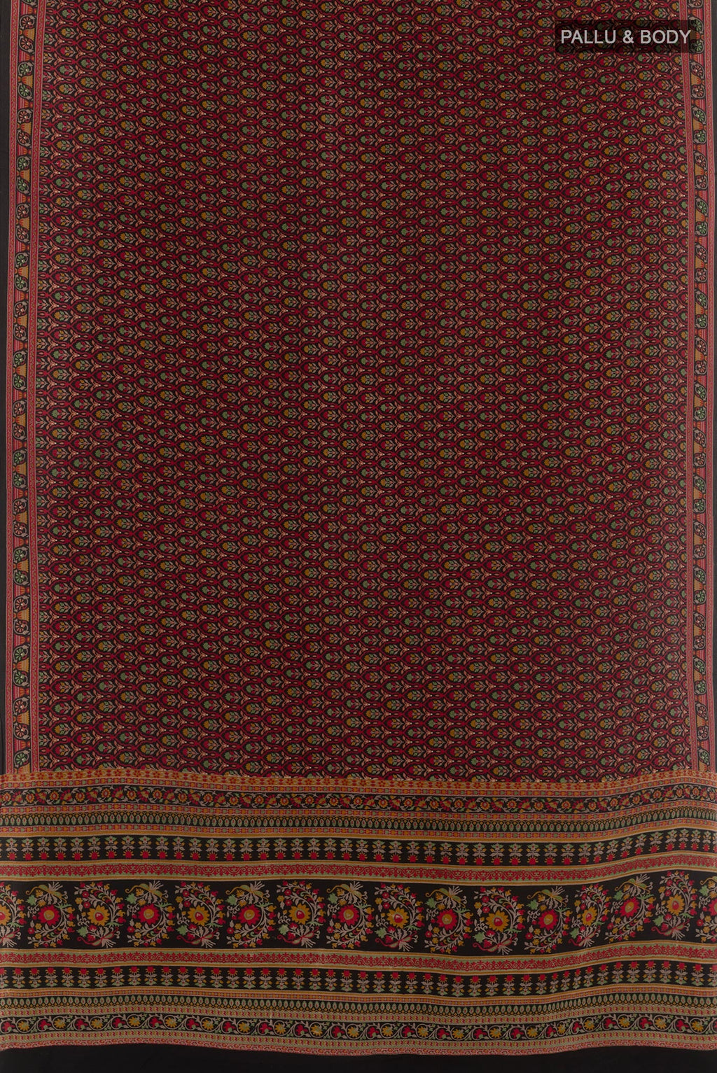 Flat view of Red Crepe Saree with Printed design on the body and Printed Border. 