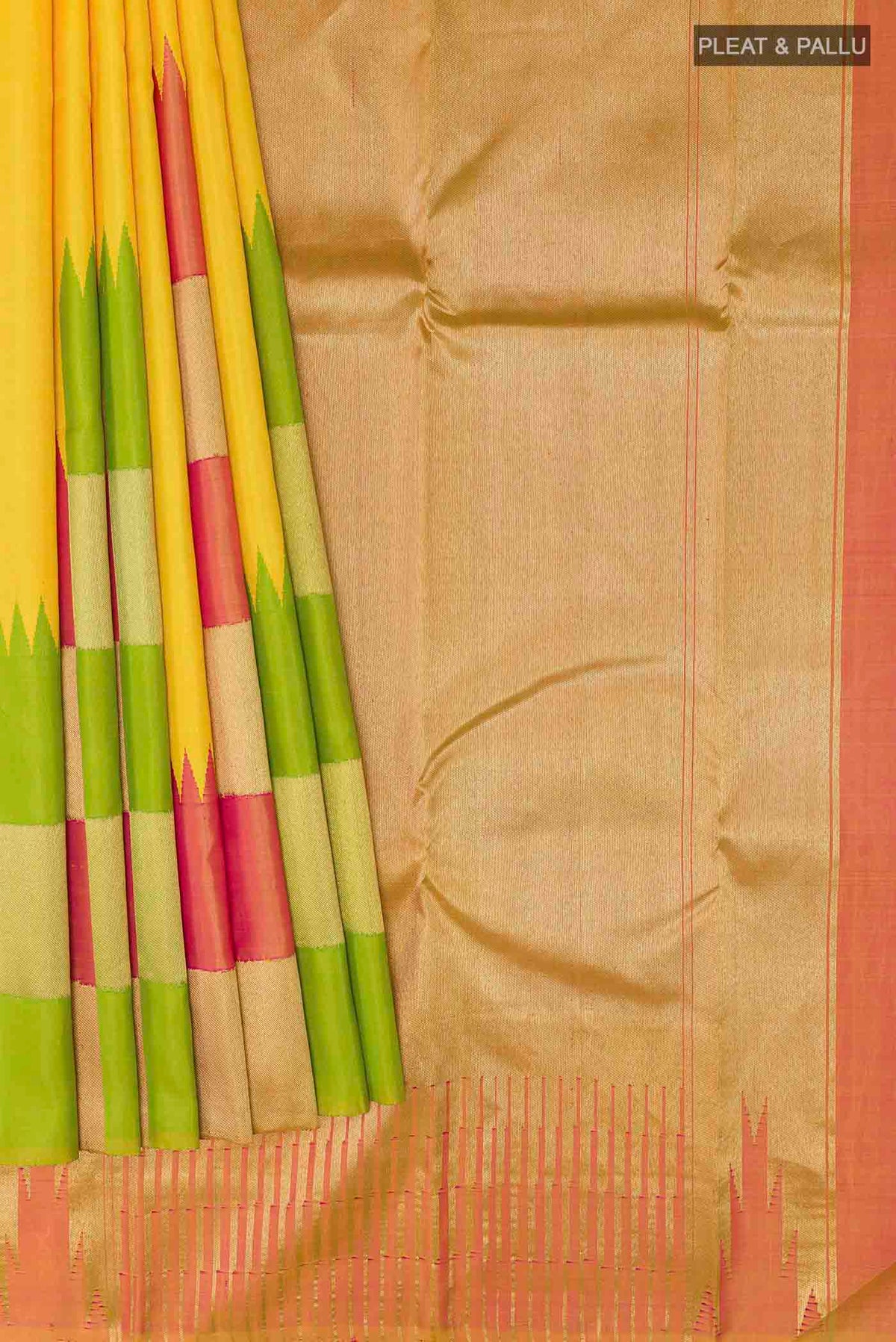 Pleats and pallu of Yellow Kanchipuram Silk Saree with Plain Body and Rising Temple Border