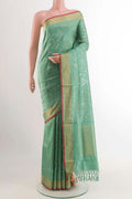 Pure Silk Pure Zari Sage Green Uppada Saree with Zari Brocade on the body and Zari Border displayed on a mannequin