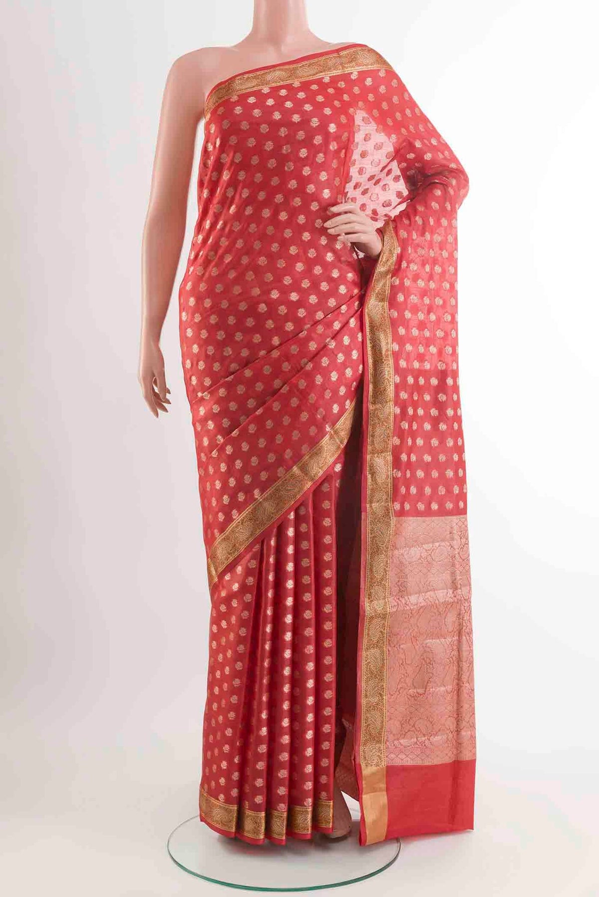 Red Banarasi Tussar Silk Saree with Zari Butta on the body and Zari Border displayed on a mannequin