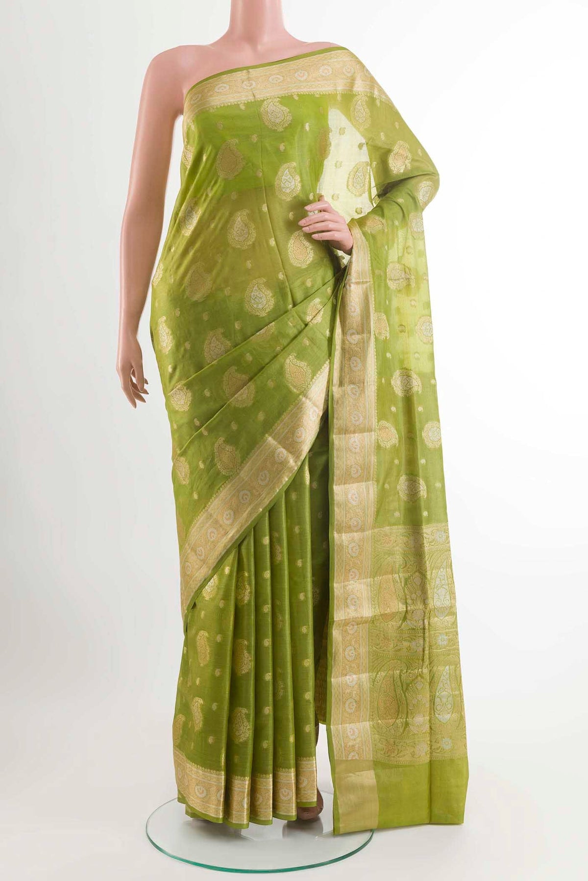 Green Banarasi Tussar Silk Saree with Zari Butta on the body and Zari Border displayed on a mannequin