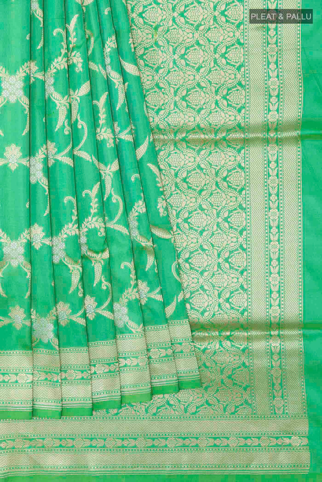 Pleats and pallu of Green Banarasi Silk Saree with Zari Brocade on the body and Zari Border