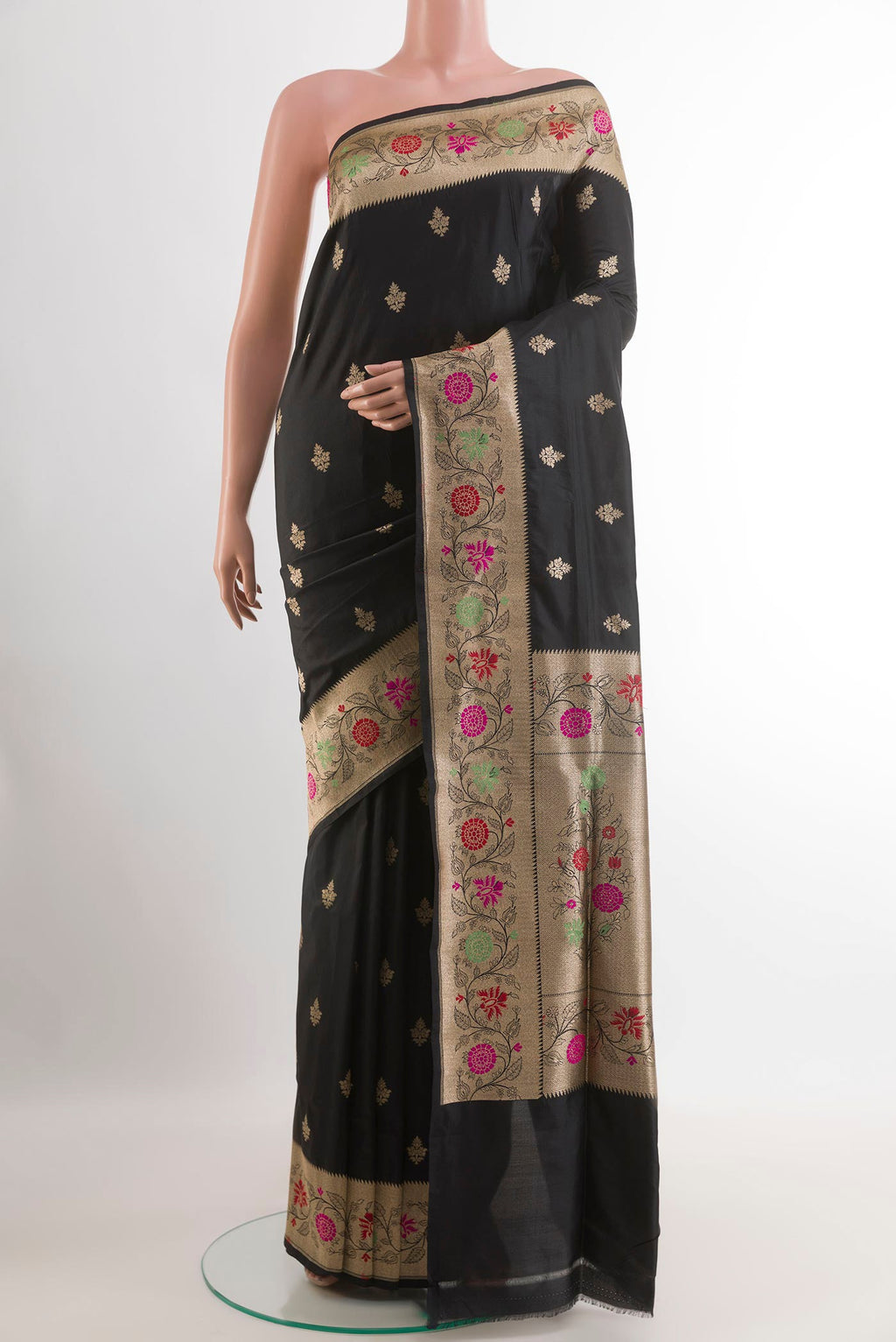 Black Banarasi Silk Saree with Zari Butta on the body and Zari Border.  displayed on a mannequin