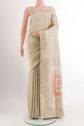 Cream Banarasi Silk Saree with Zari Brocade on the body and Zari Border displayed on a mannequin