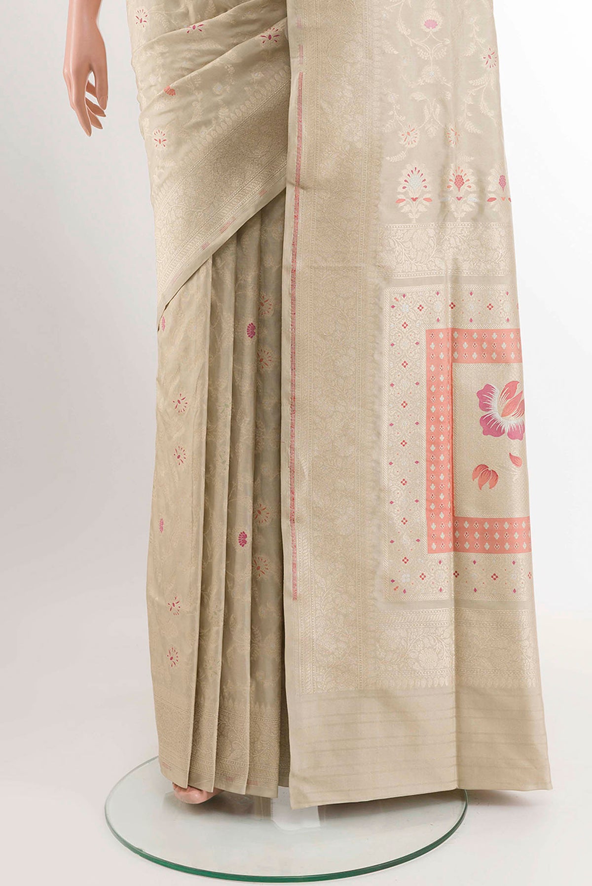 Pleats and pallu of Cream Banarasi Silk Saree with Zari Brocade on the body and Zari Border