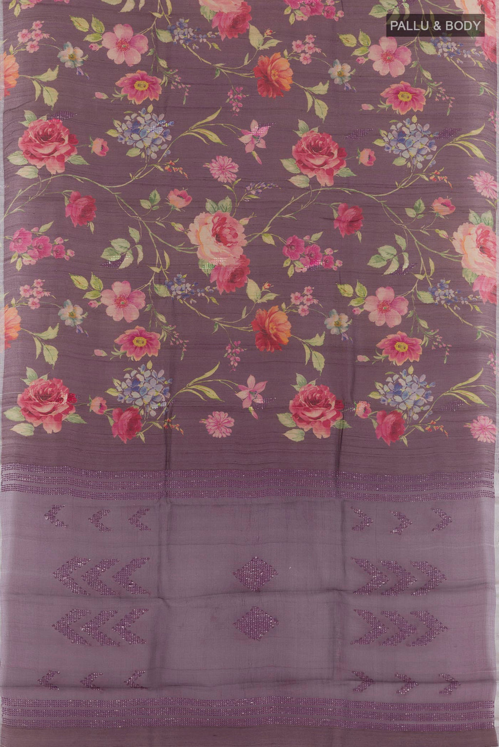 Flat view of Purple Tussar Saree with Printed design on the body and Zari Border. 