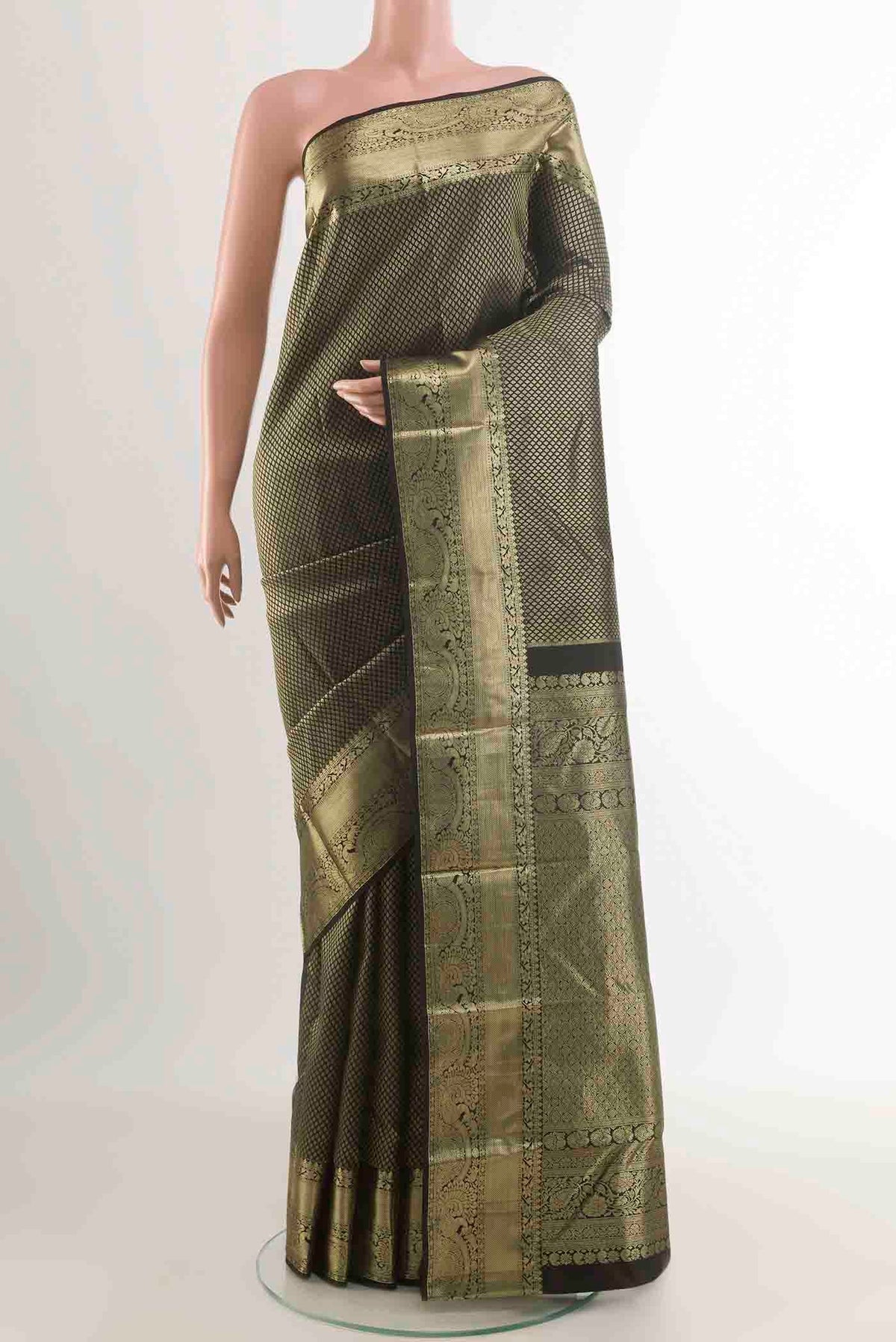 Black Kanchipuram Silk Saree with Zari Brocade on the body and Zari Border displayed on a mannequin