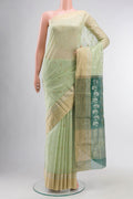 Green Chanderi Silk Cotton Saree with Zari Butta on the body and Zari Border displayed on a mannequin