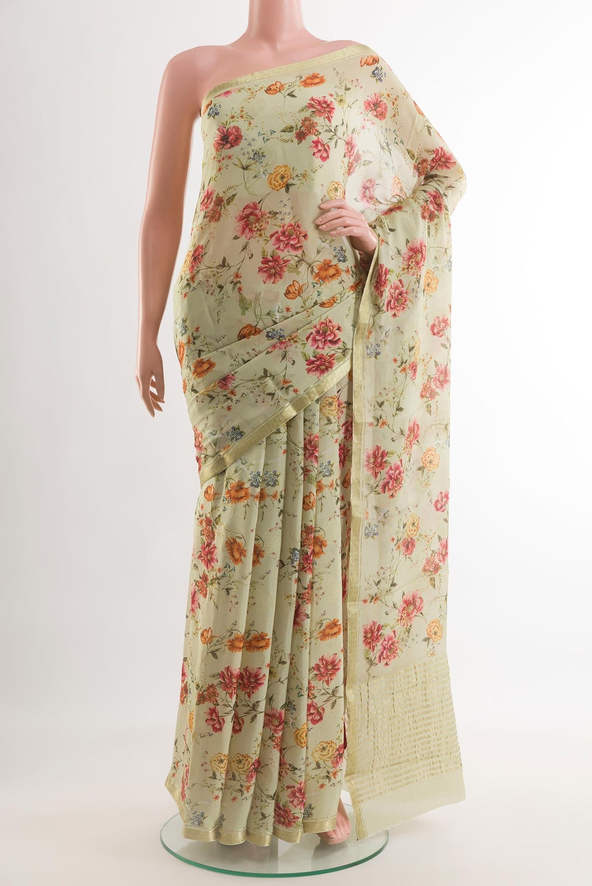 Beige Mysore Chiffon Saree with Floral Print on the body and Zari Border.  displayed on a mannequin