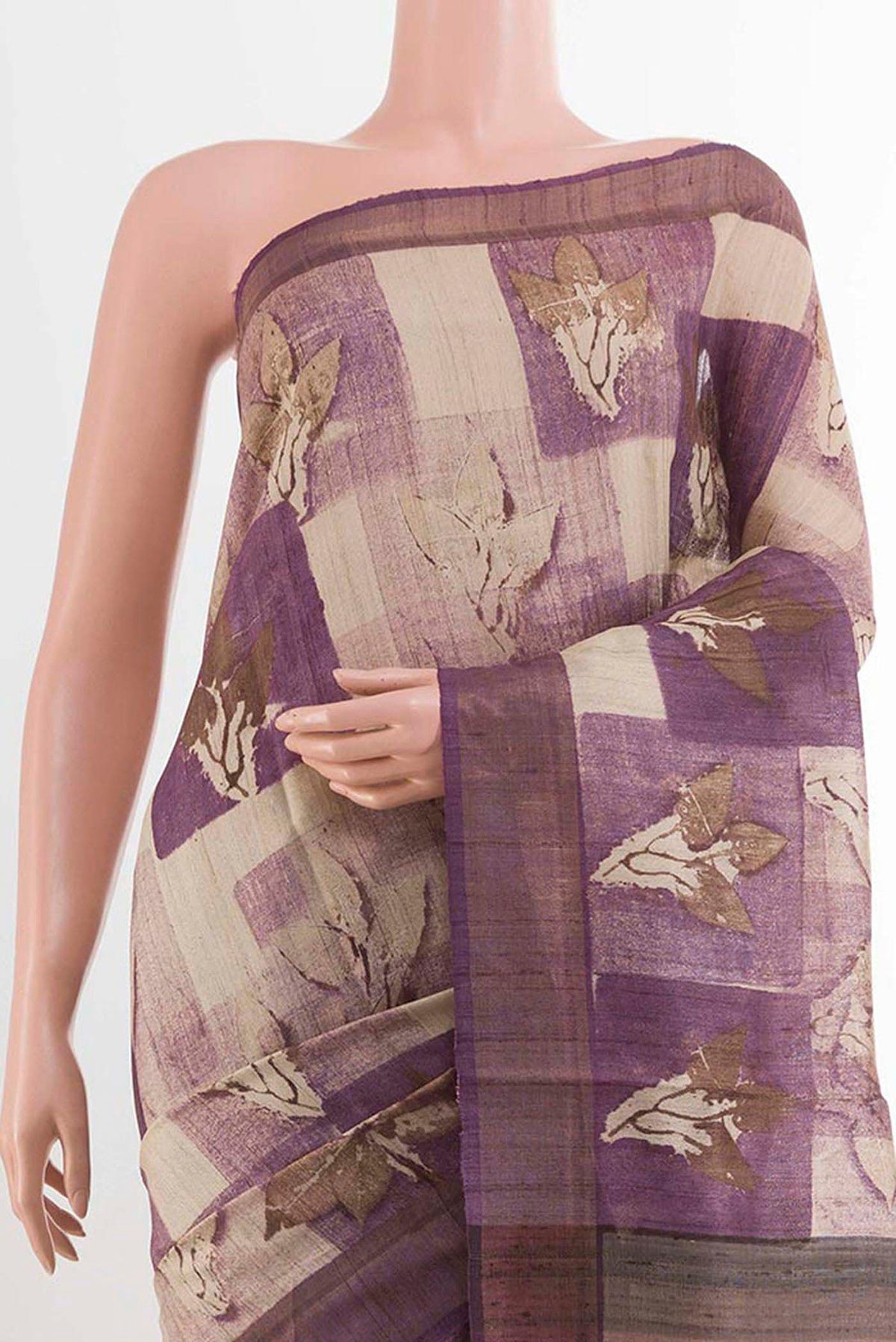 Border image of Purple Tussar Saree with Printed design on the body and Zari Border