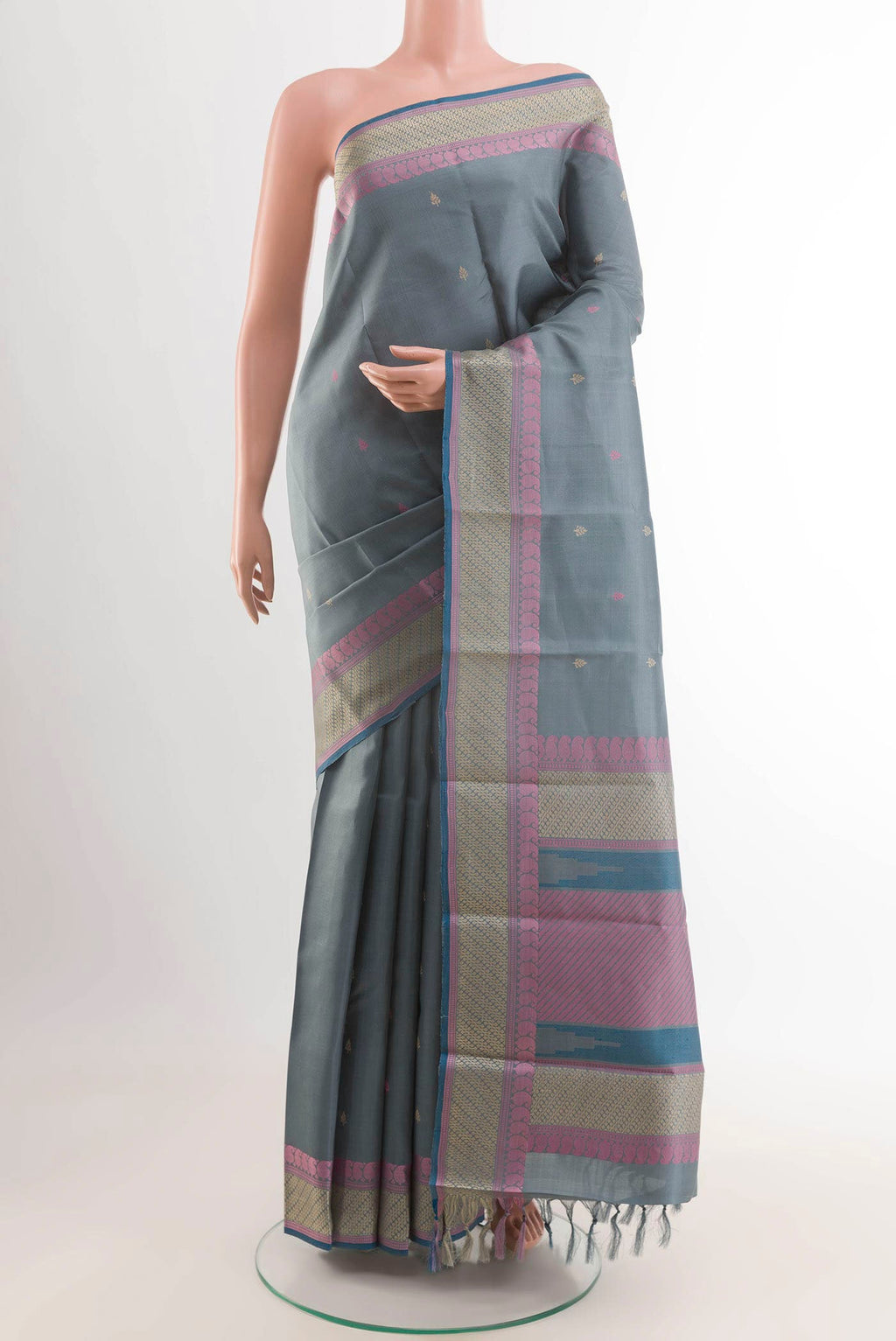 Grey Kanchipuram Silk Saree with Thread Butta on the body and Thread Embroidery Border displayed on a mannequin