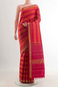 Maroon Kanchipuram Silk Saree with Stripes on the body and Zari Border displayed on a mannequin