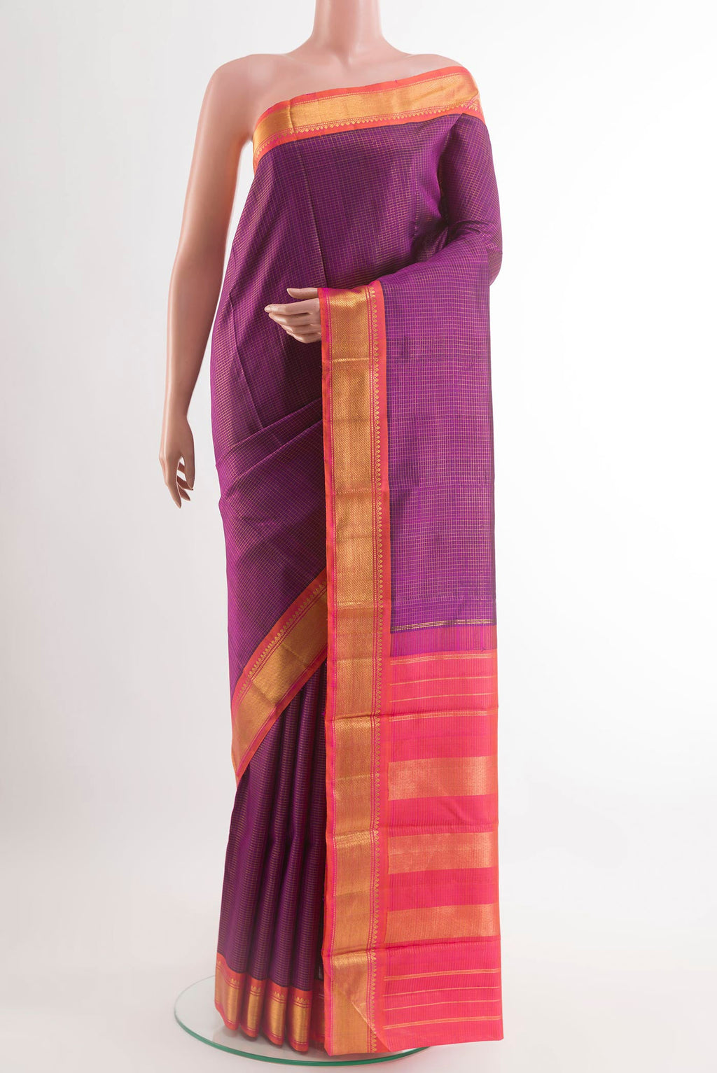 Purple Kanchipuram Silk Saree with Checked design on the body and Zari Border.  displayed on a mannequin