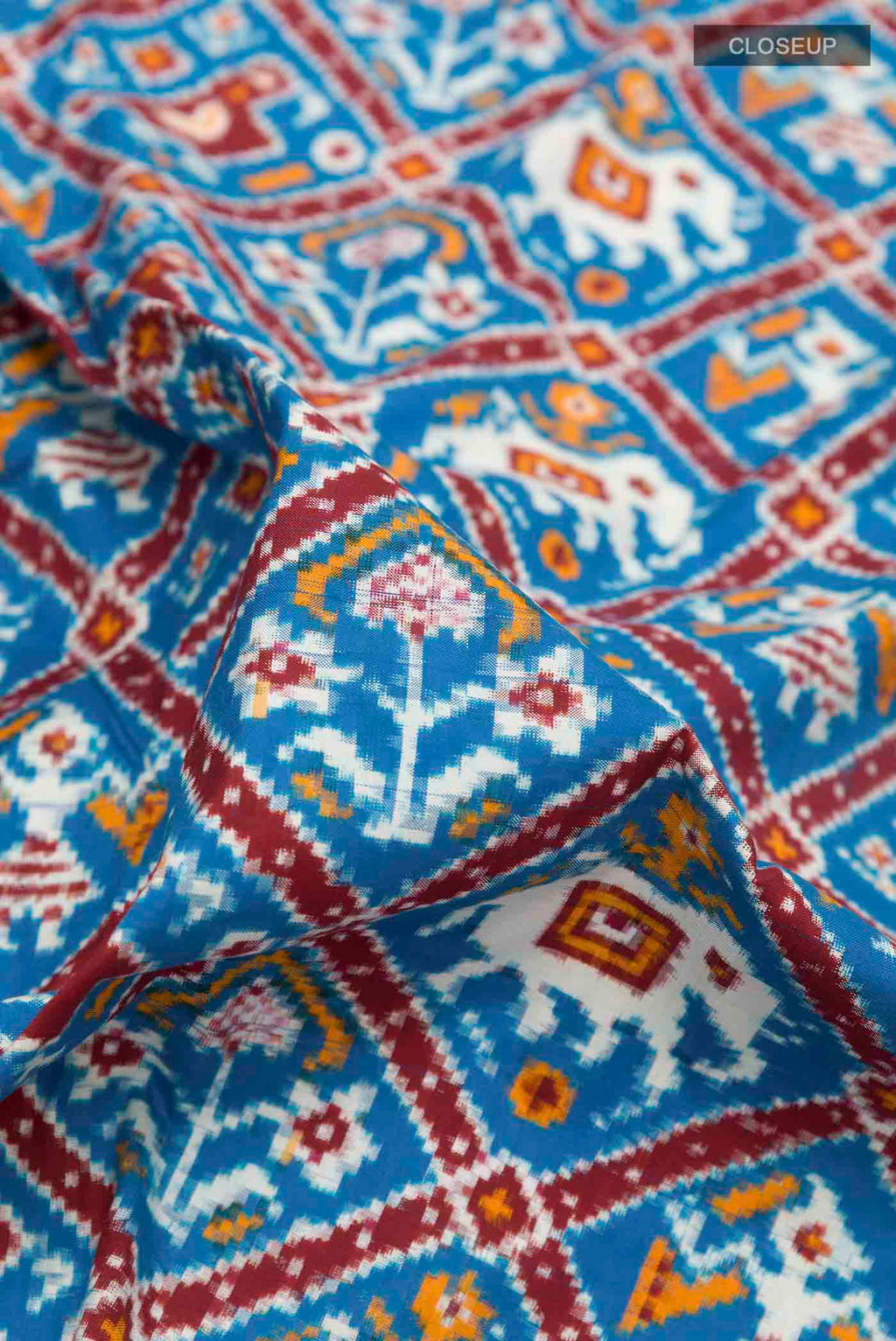 Close up of Blue Pochampally Silk Saree with Pure Ikat on the body and Ikat Border displaying folds