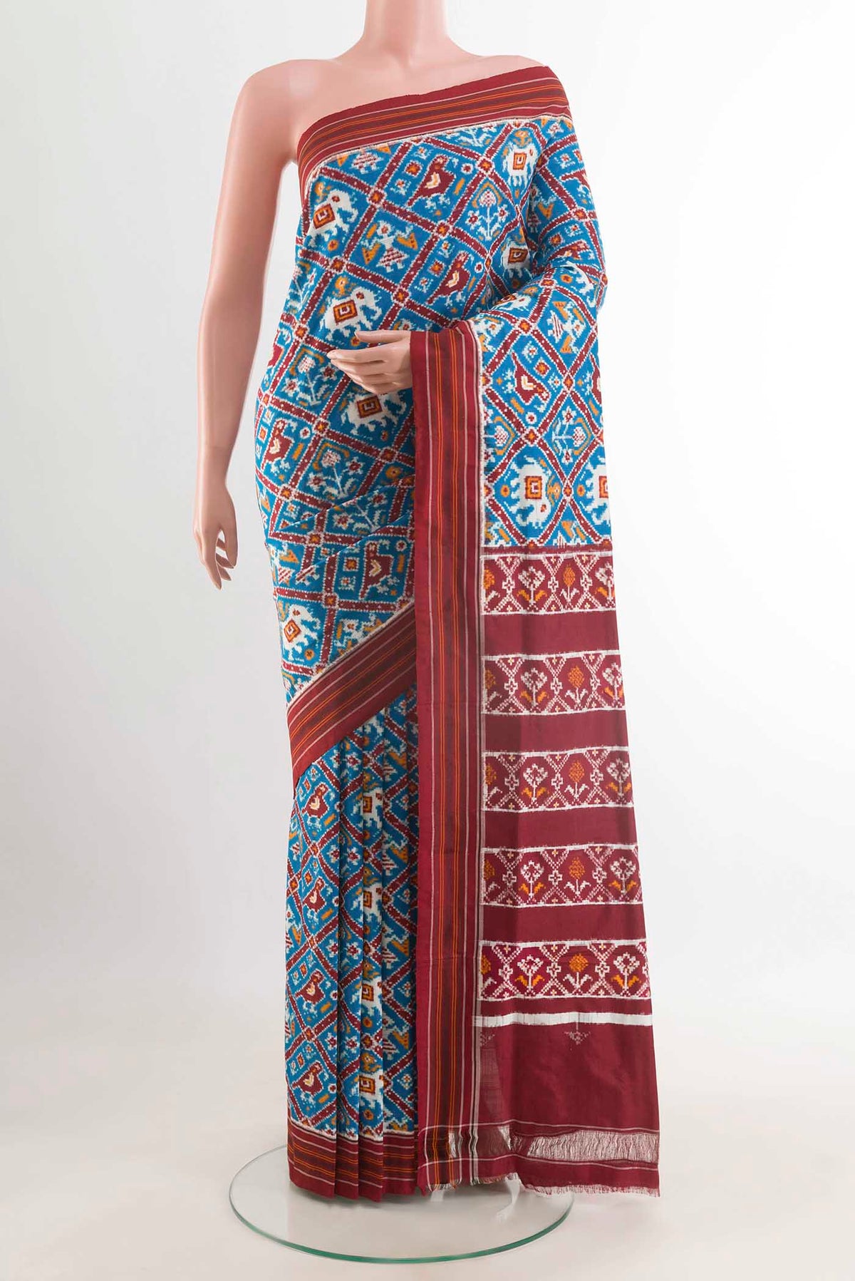 Blue Pochampally Silk Saree with Pure Ikat on the body and Ikat Border displayed on a mannequin