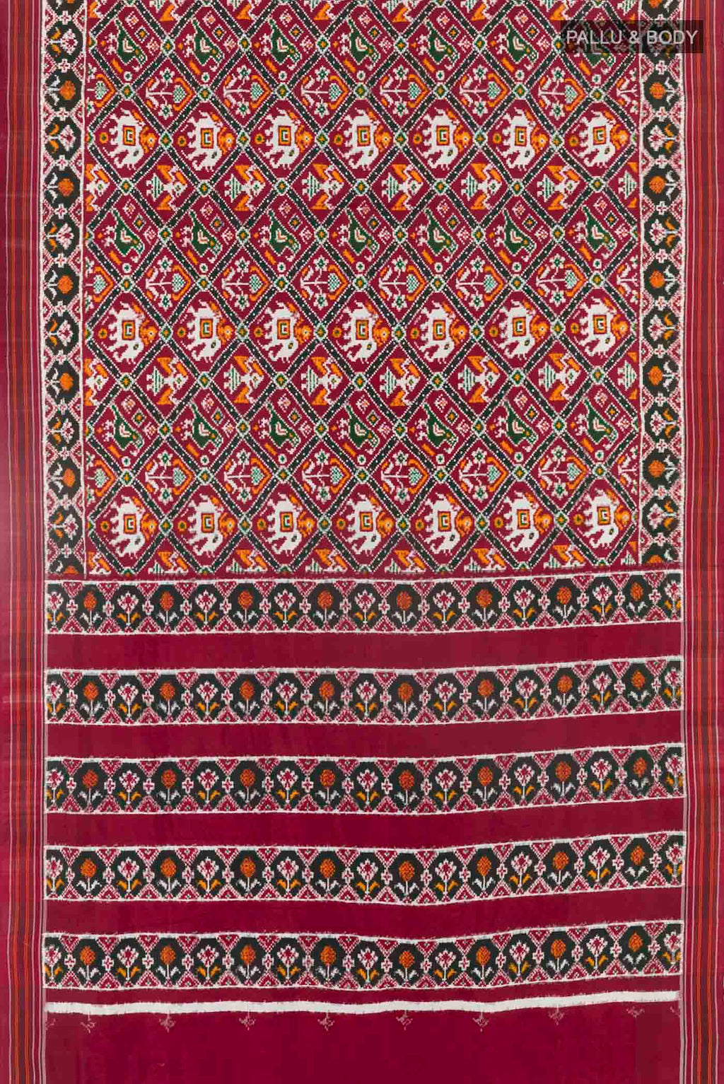 Flat view of Maroon Pochampally Silk Saree with Pure Ikat on the body and Ikat Border