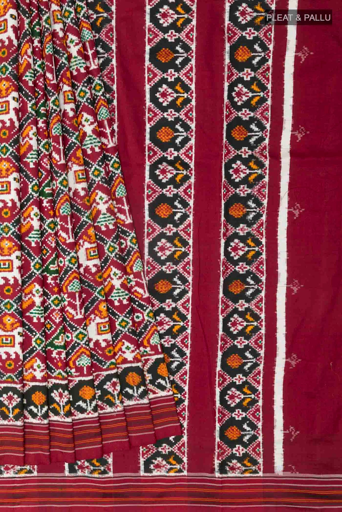 Pleats and pallu of Maroon Pochampally Silk Saree with Pure Ikat on the body and Ikat Border