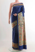 Blue Tussar Saree with Printed design on the body and Printed Border displayed on a mannequin
