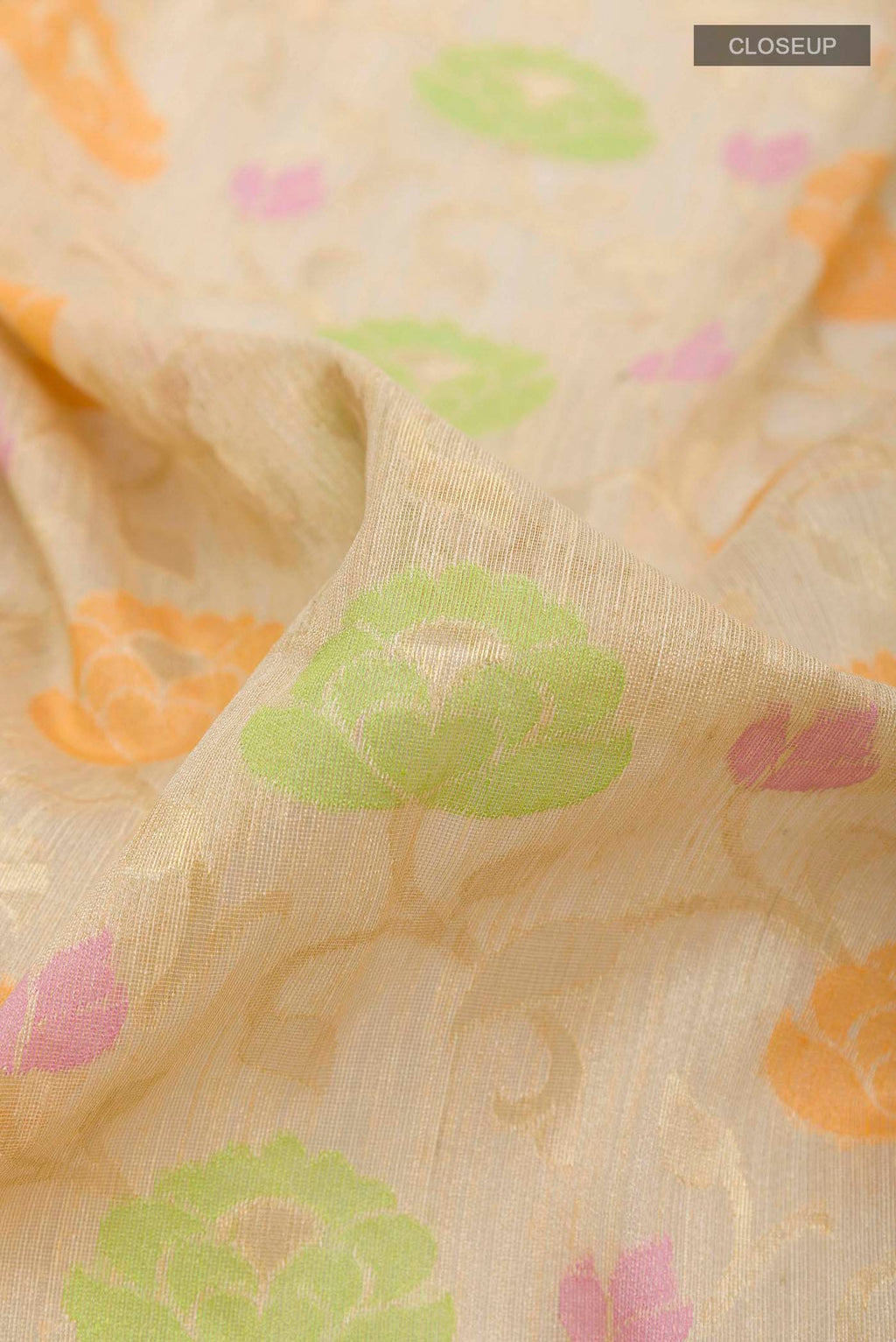 Close up of Beige Banarasi Kora Silk Saree with Thread Brocade on the body and Zari Border displaying folds