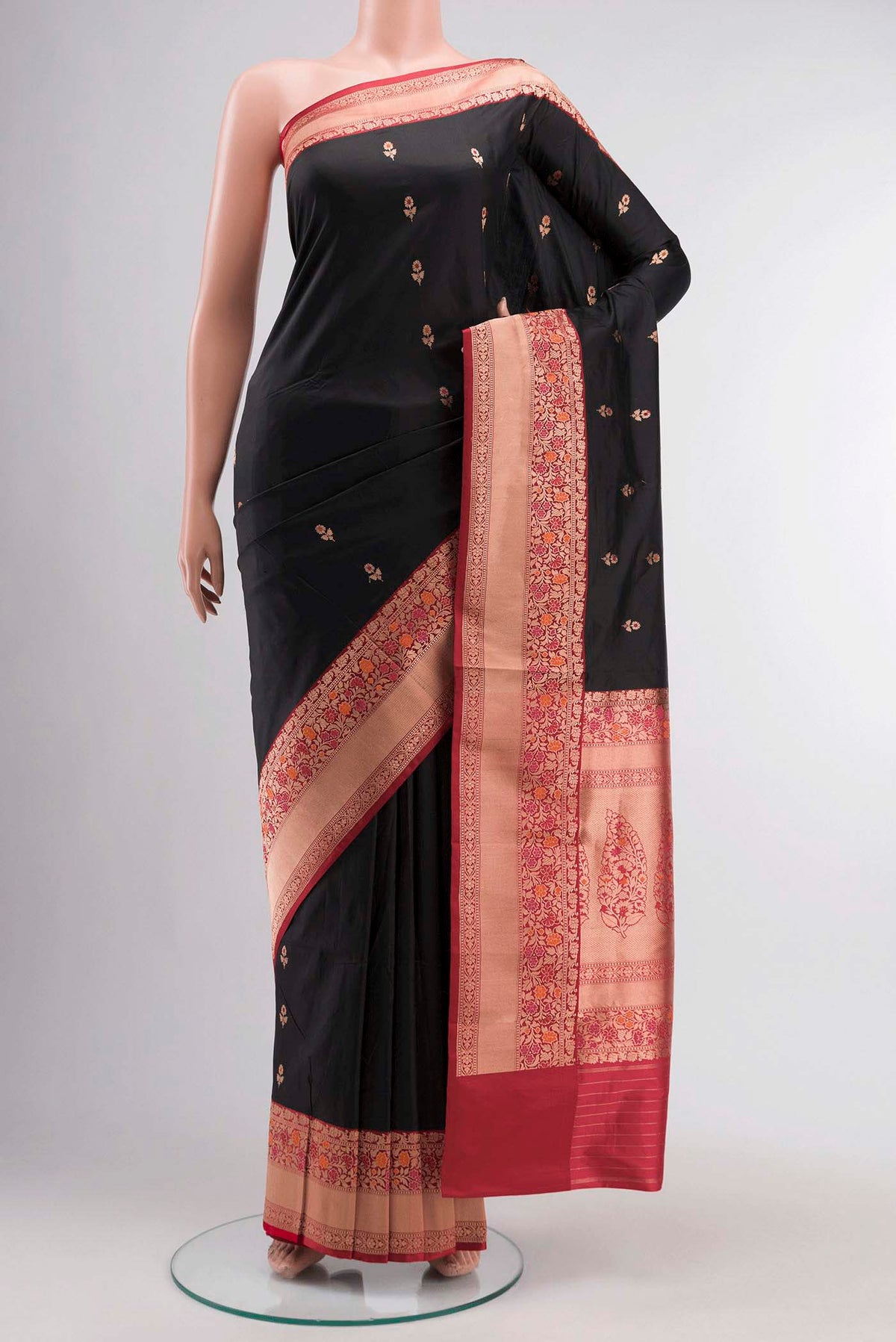 Black Banarasi Katan Silk Saree with Zari Butta on the body and Zari Border displayed on a mannequin