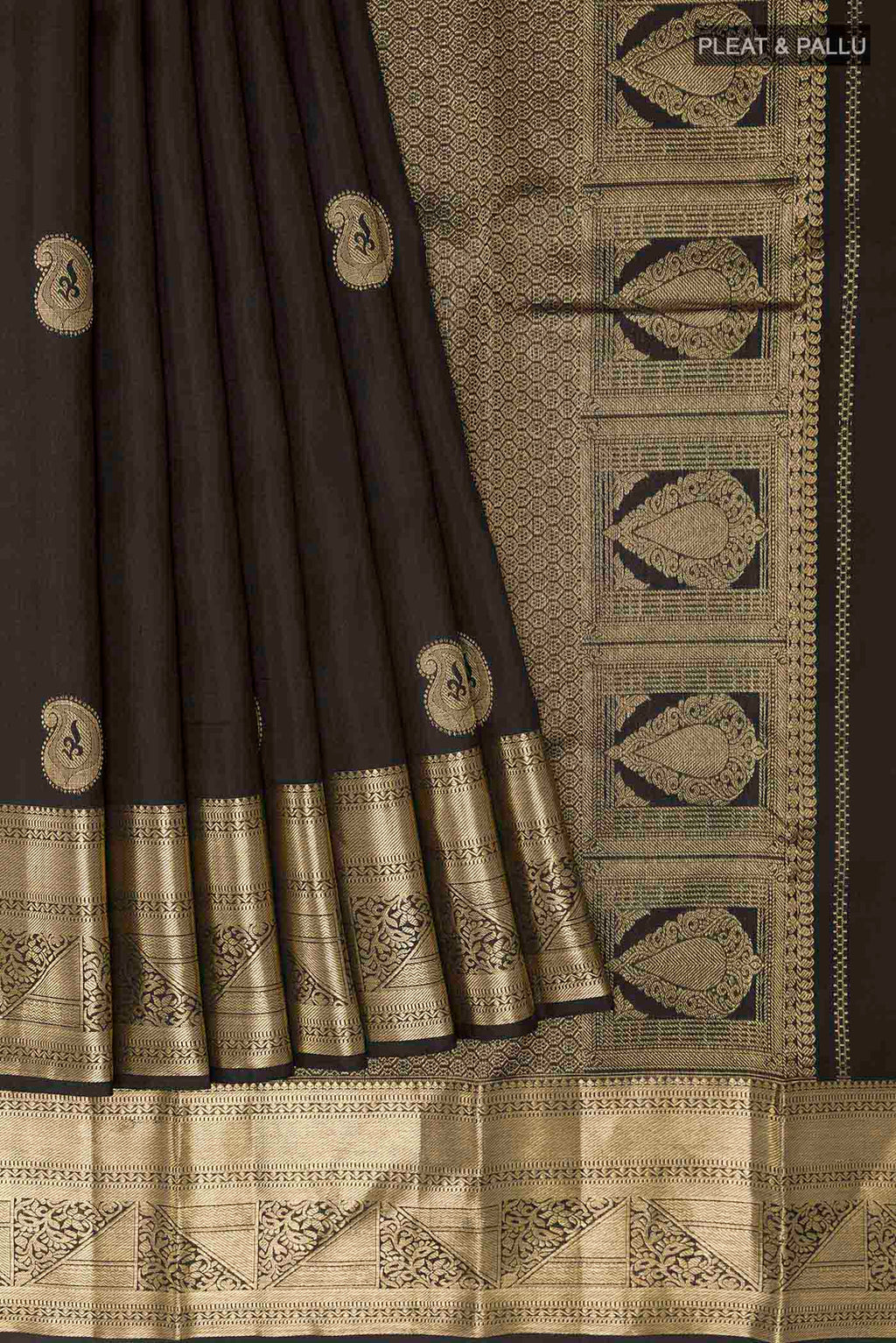 Pleats and pallu of Black Kanchipuram Silk Saree with Zari Butta on the body and Zari Border