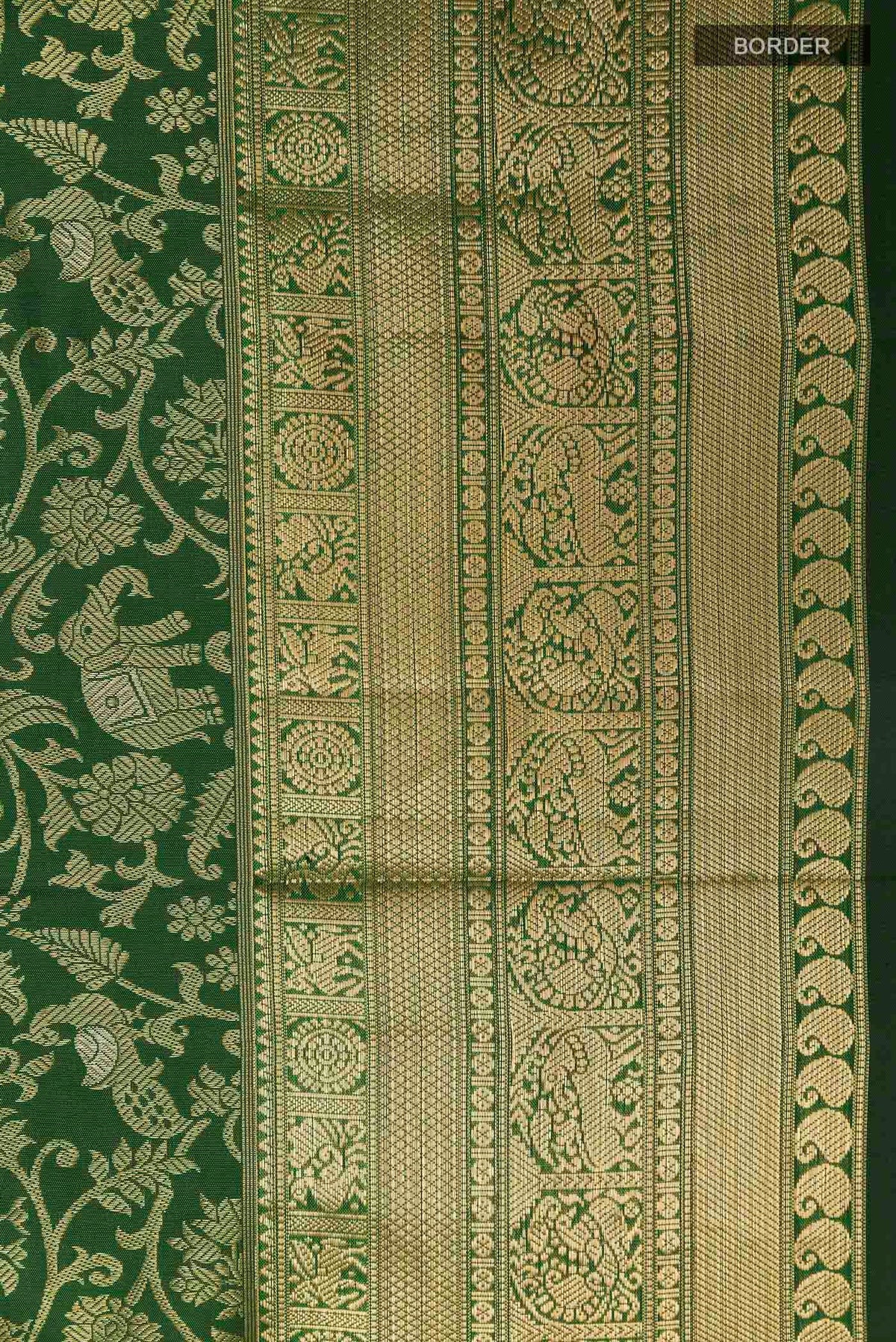 Border image of Green Kanchipuram Silk Saree with Zari Brocade on the body and Zari Border