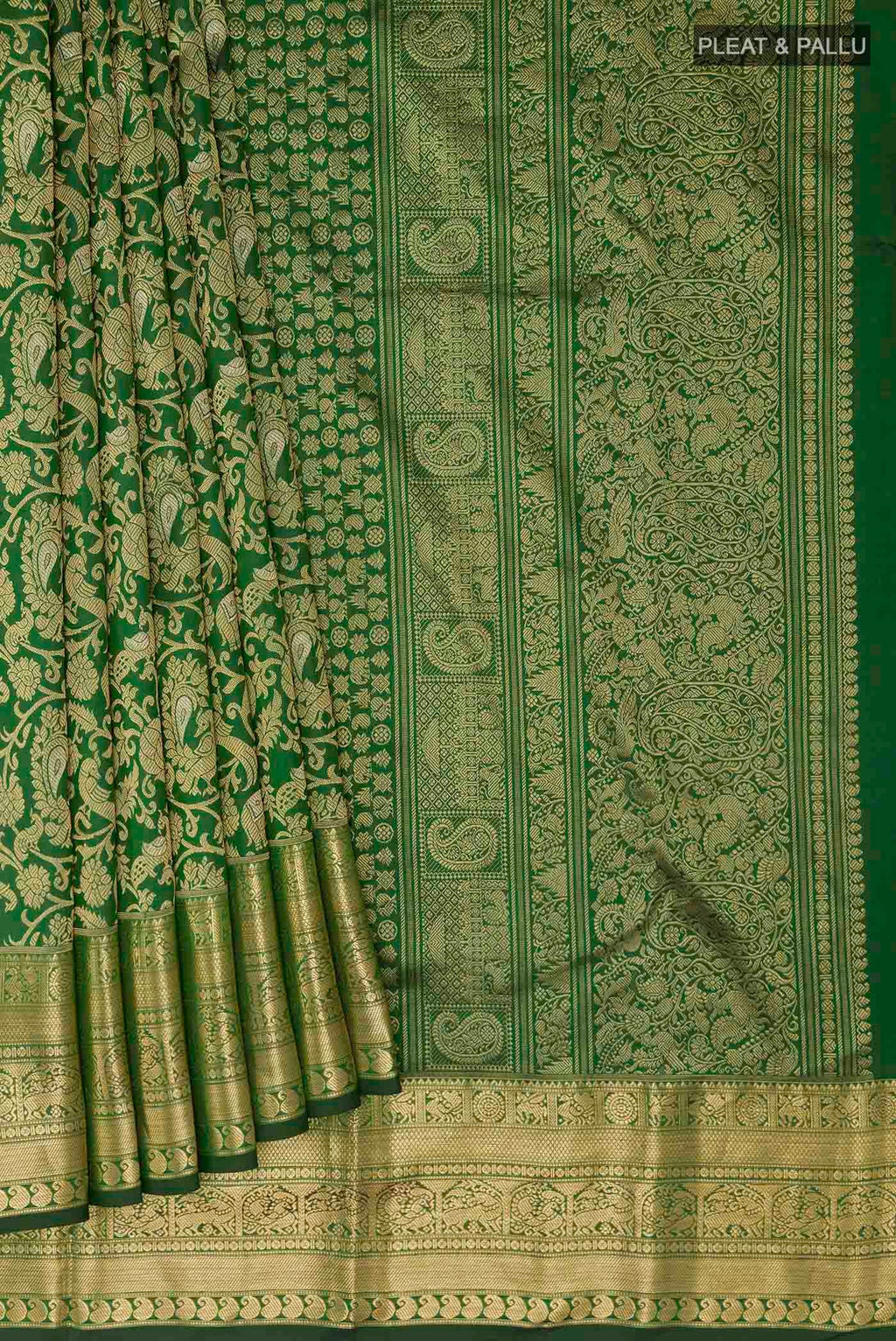 Pleats and pallu of Green Kanchipuram Silk Saree with Zari Brocade on the body and Zari Border