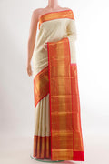 Off White Kanchipuram Silk Saree with Zari Brocade on the body and Zari Border.  displayed on a mannequin