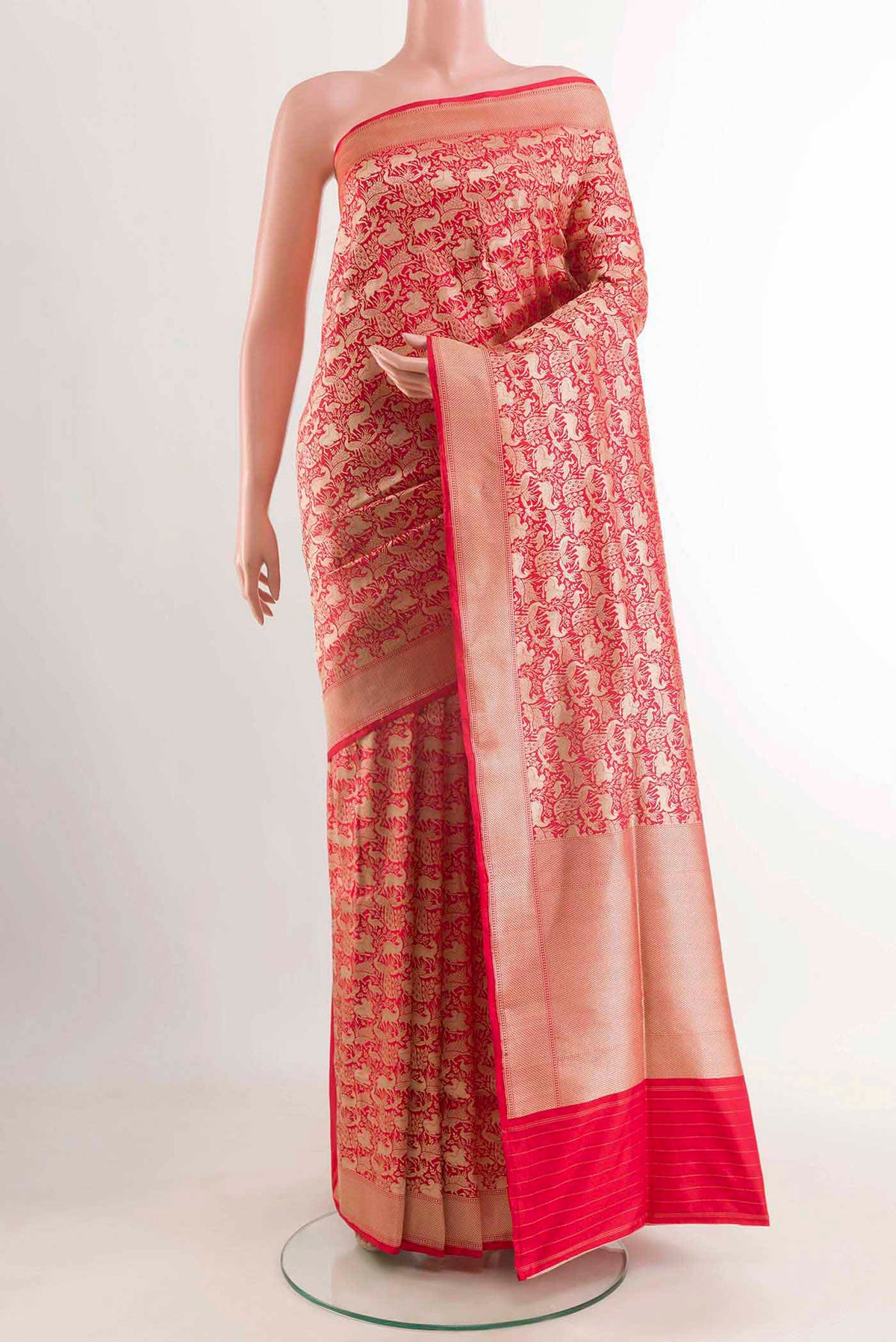 Red Banarasi Silk Saree with Stripes on the body and Zari Border displayed on a mannequin