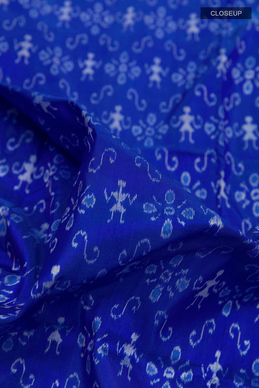 Close up of Blue Orissa Silk Saree with Pure Ikat on the body and Thread Border displaying folds