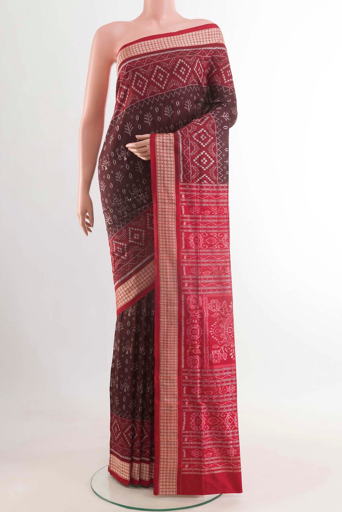 Brown Orissa Silk Saree with Pure Ikat on the body and Thread Border displayed on a mannequin