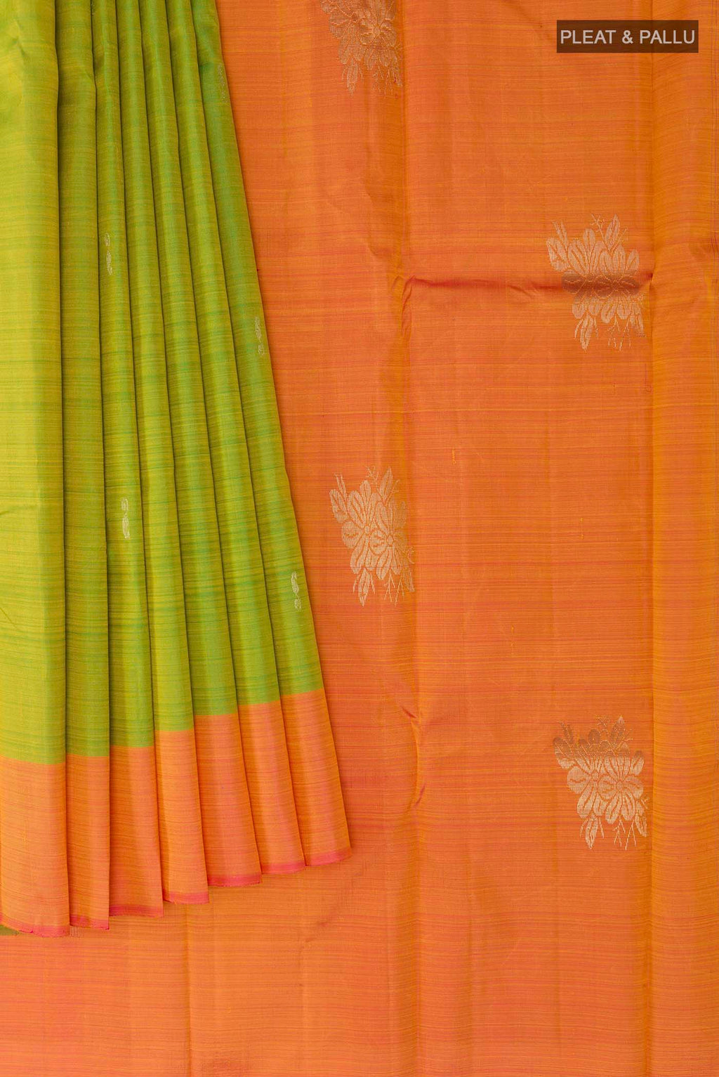 Pleats and pallu of Green Kanchipuram Silk Saree with Zari Butta on the body and Zari Border