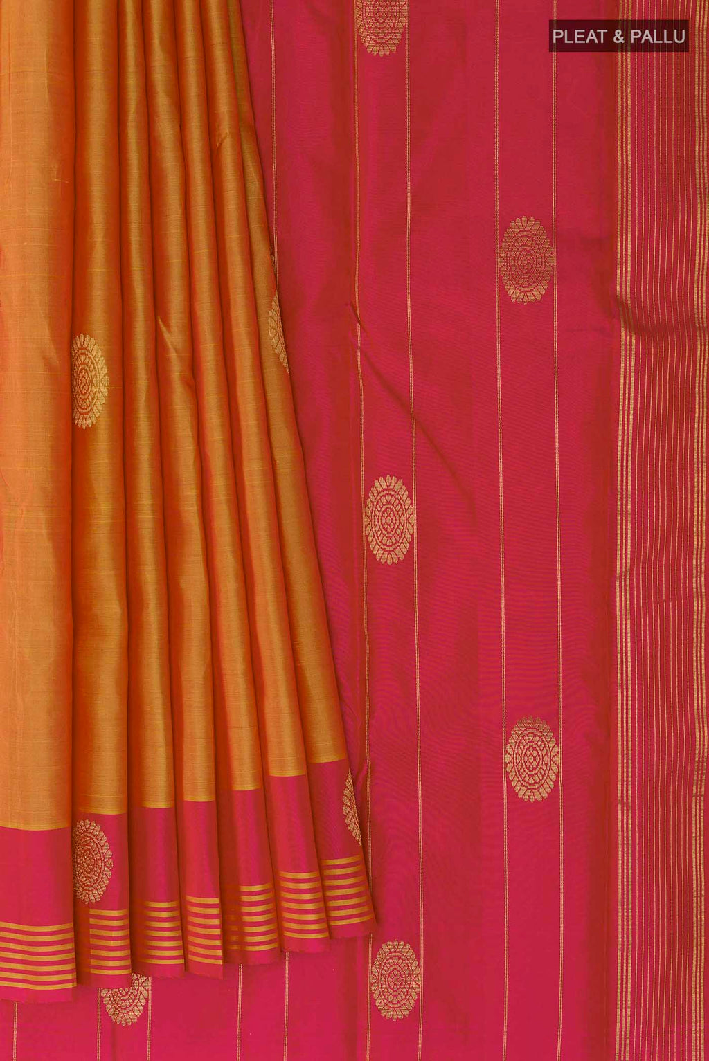 Pleats and pallu of Orange Kanchipuram Silk Saree with Zari Butta on the body and Zari Border