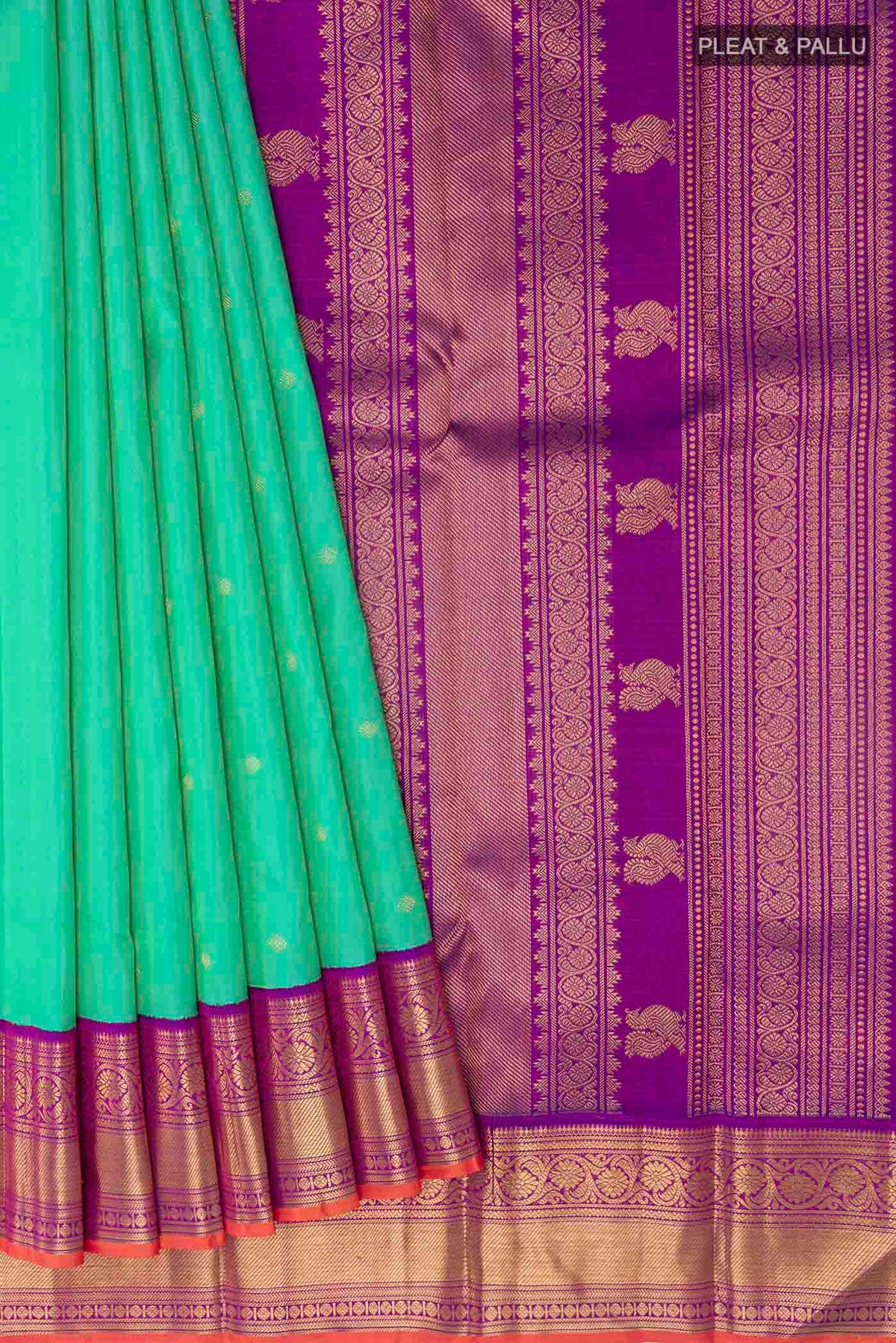 Pleats and pallu of Sea Green Kanchipuram Silk Saree with Zari Butta on the body and Zari Border