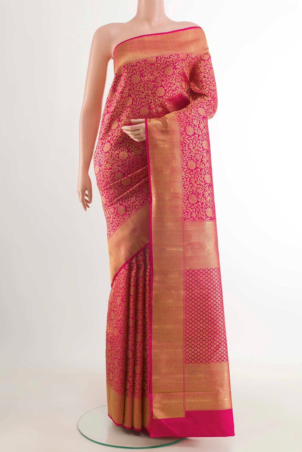 Pure Silk Pure Zari Pink Kanchipuram Saree with Zari Brocade on the body and Zari Border displayed on a mannequin