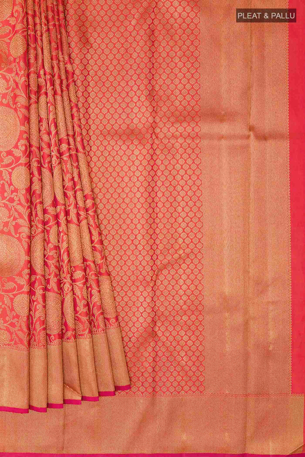 Pleats and pallu of Red Kanchipuram Silk Saree with Zari Brocade on the body and Zari Border