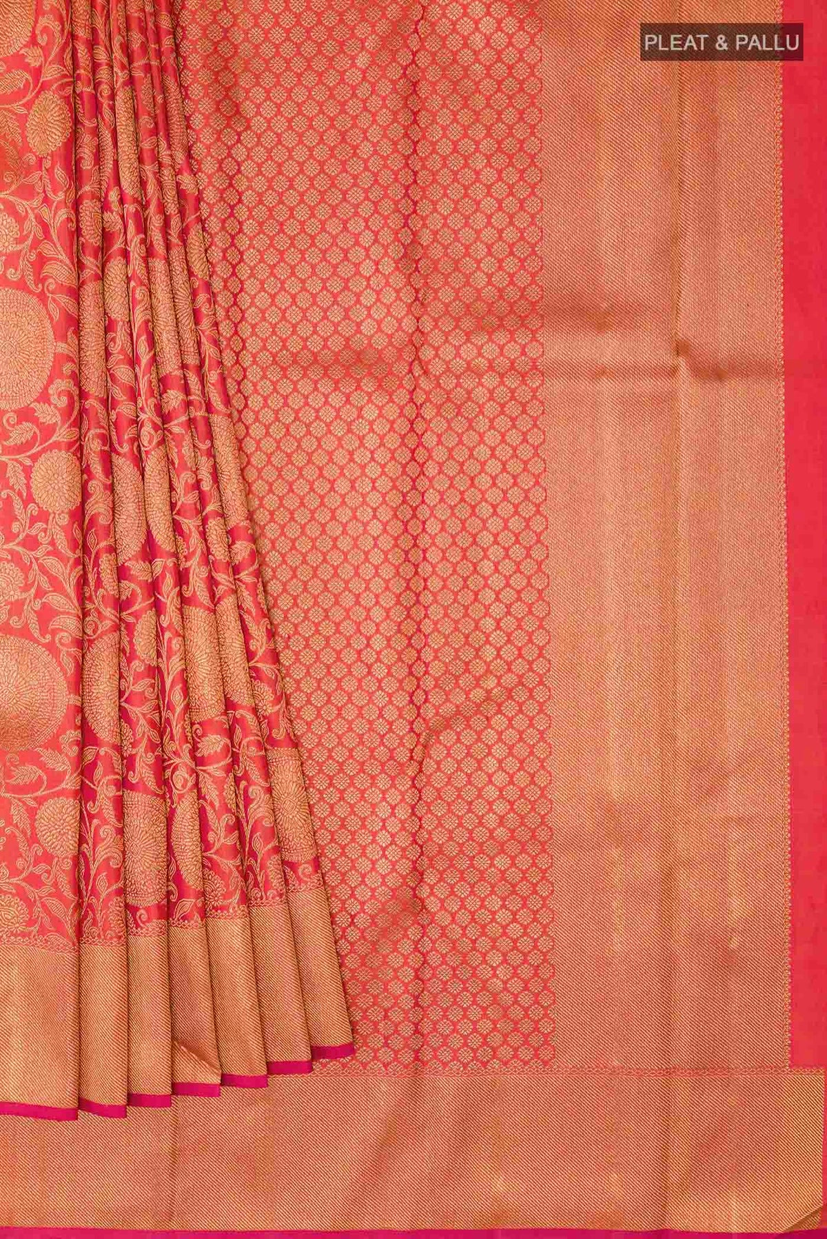 Pleats and pallu of Red Kanchipuram Silk Saree with Zari Brocade on the body and Zari Border