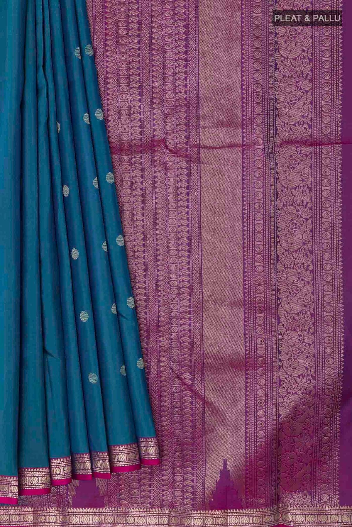 Pleats and pallu of Blue Kanchipuram Silk Saree with Zari Butta on the body and Zari Border