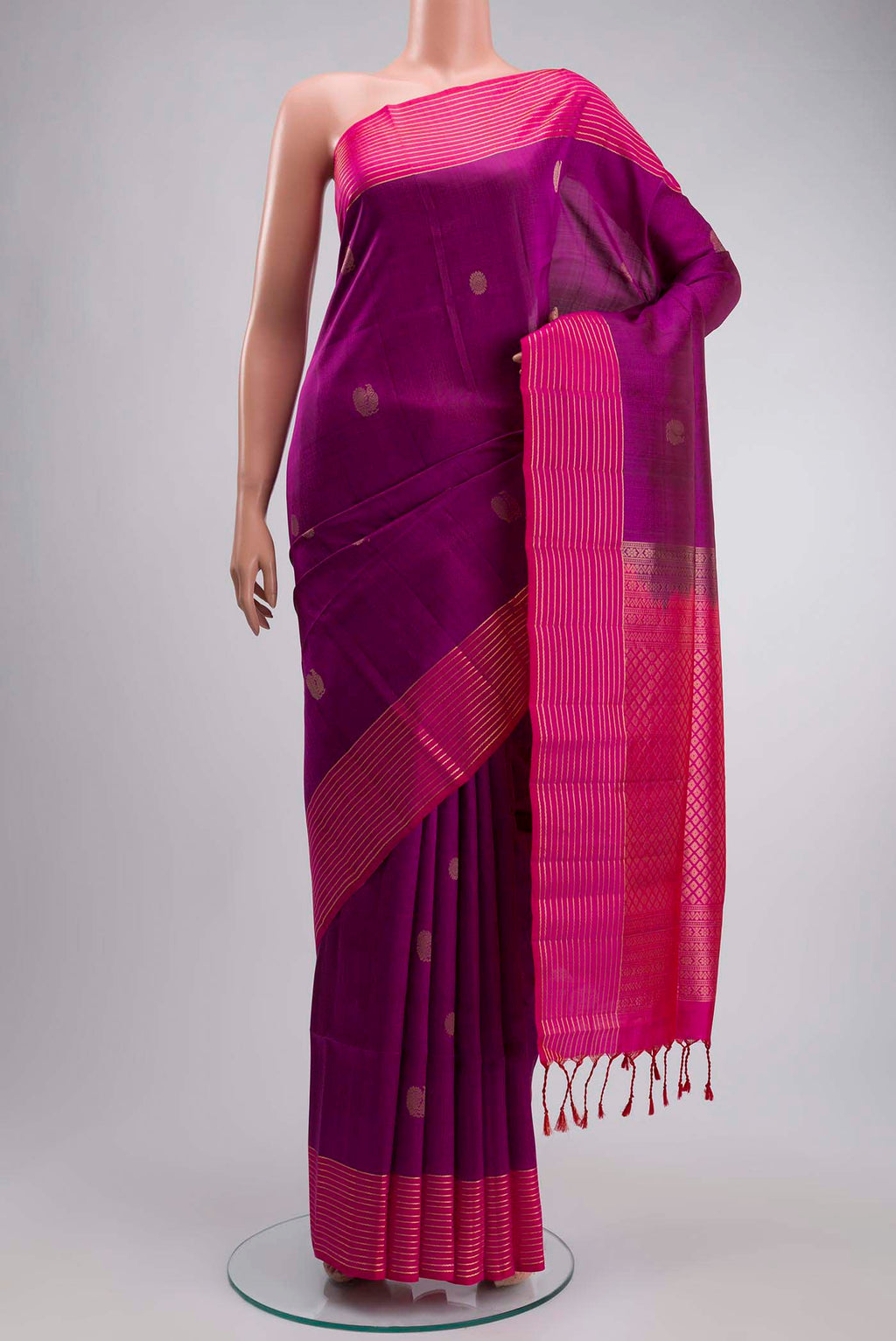 Purple Soft Silk Saree with Zari Butta on the body and Zari Border displayed on a mannequin