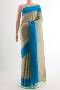Sage Green Soft Silk Saree with Zari Butta on the body and Zari Border.  displayed on a mannequin