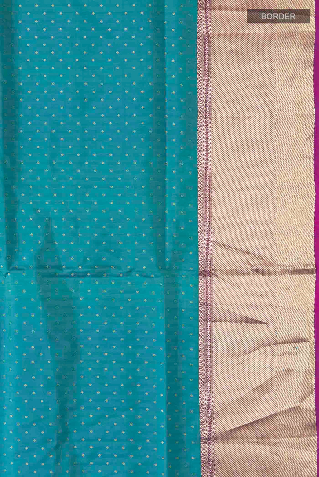 Border image of Blue Soft Silk Saree with Zari Butta on the body and Zari Border