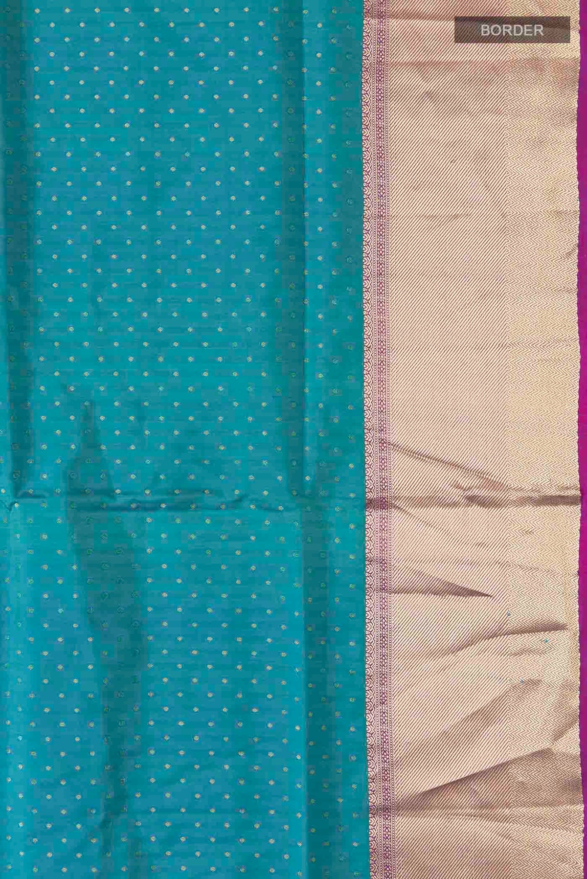 Border image of Blue Soft Silk Saree with Zari Butta on the body and Zari Border