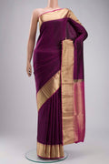 Purple Soft Silk Saree with Zari Butta on the body and Zari Border displayed on a mannequin