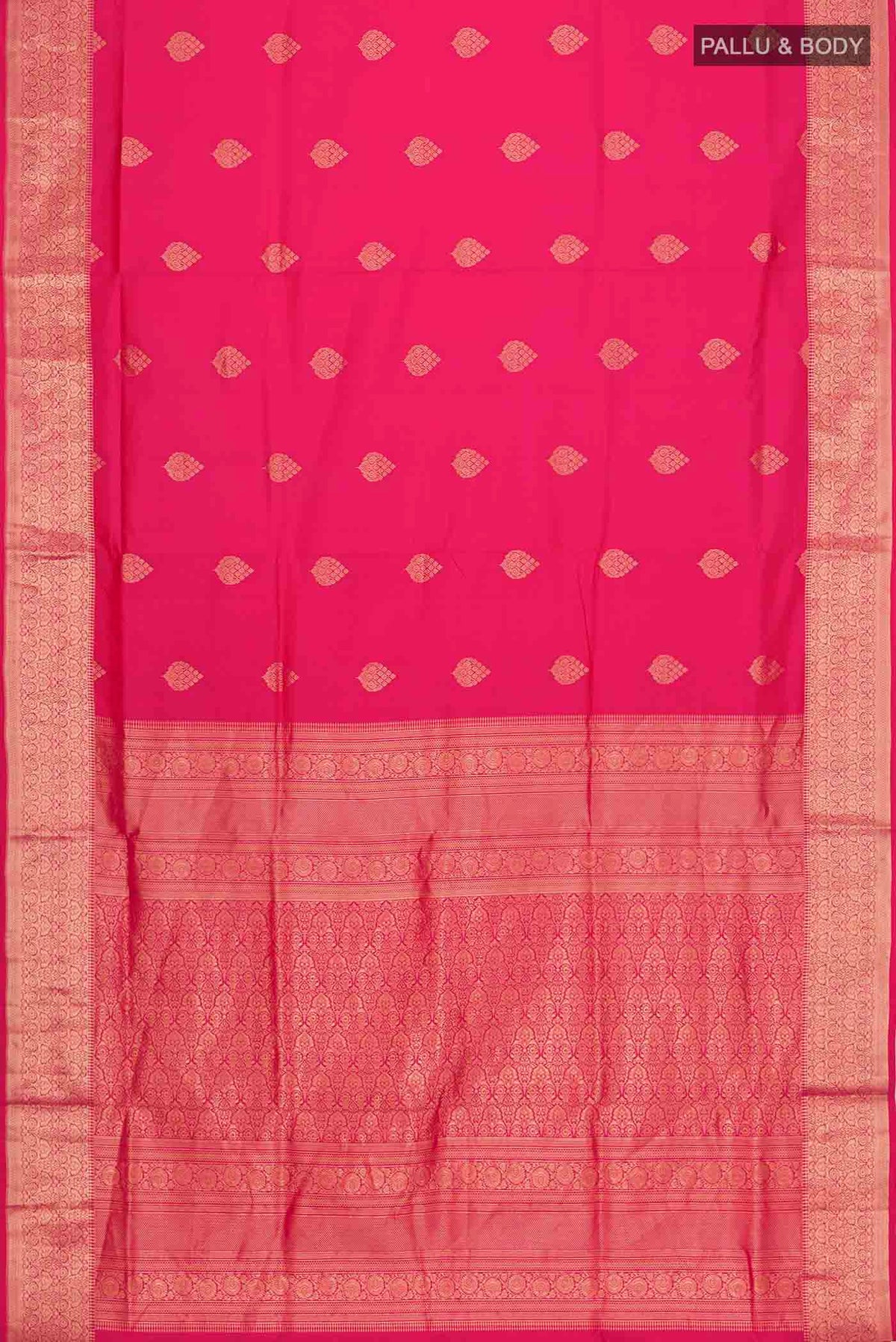 Flat view of Pink Soft Silk Saree with Zari Butta on the body and Zari Border