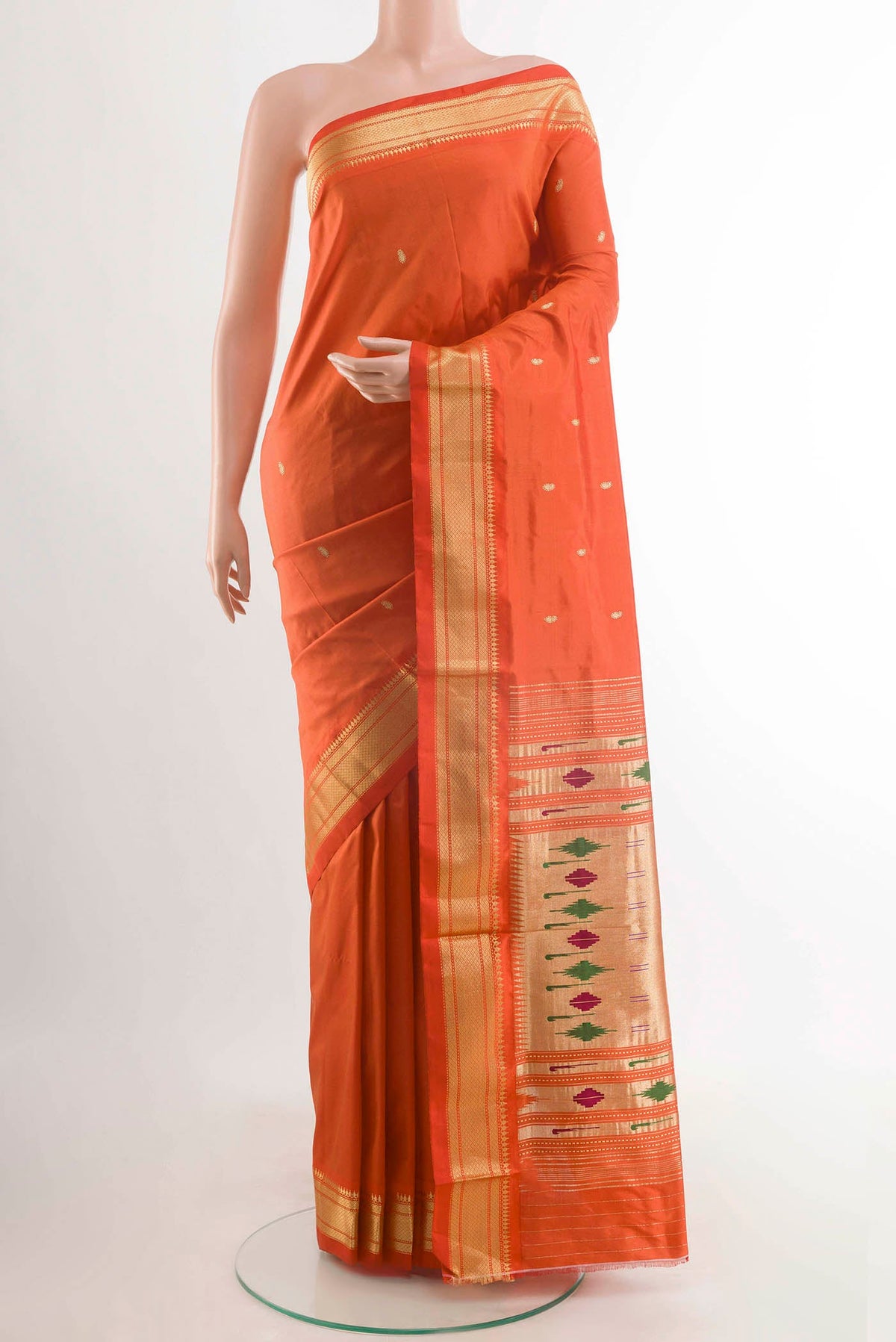 Orange Paithani Silk Saree with Zari Butta on the body and Zari Border displayed on a mannequin