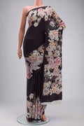 Black Crepe Saree with Printed design on the body and Plain Border displayed on a mannequin