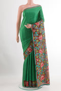 Green Tussar Saree with Plain Body and Plain Border.  displayed on a mannequin