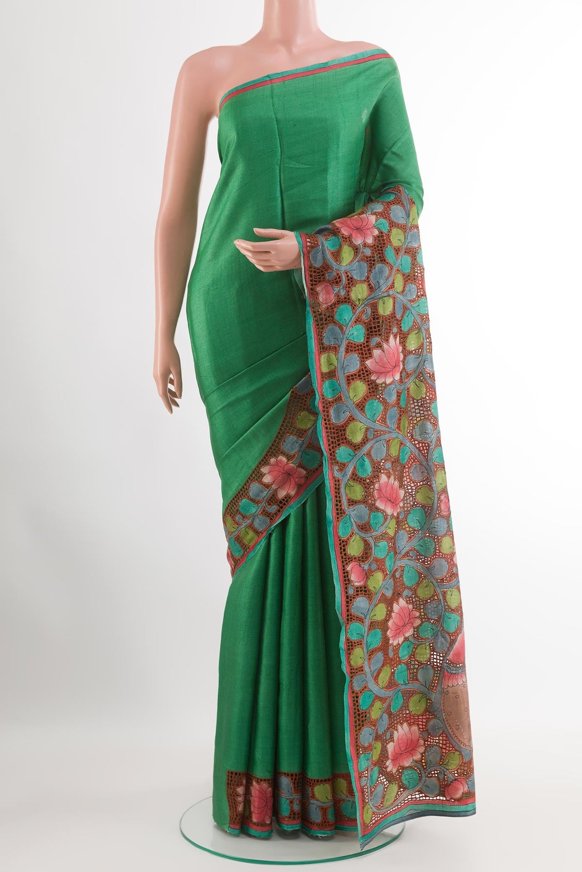 Green Tussar Saree with Plain Body and Plain Border.  displayed on a mannequin