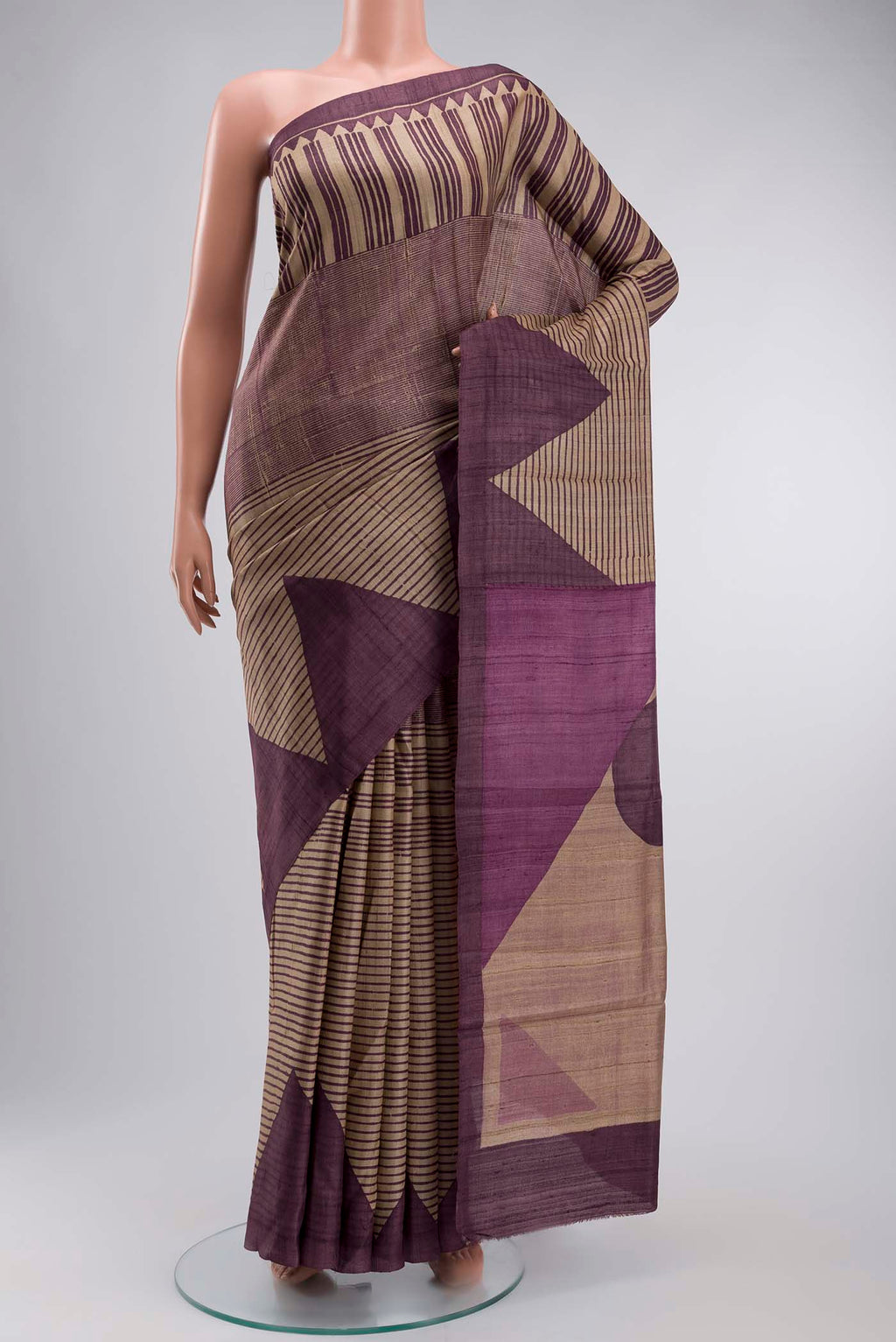 Purple Tussar Silk Saree with Stripes on the body and Temple Border displayed on a mannequin